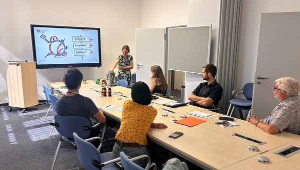 Teilnehmer einer Veranstaltung zur Ergonomieanalyse